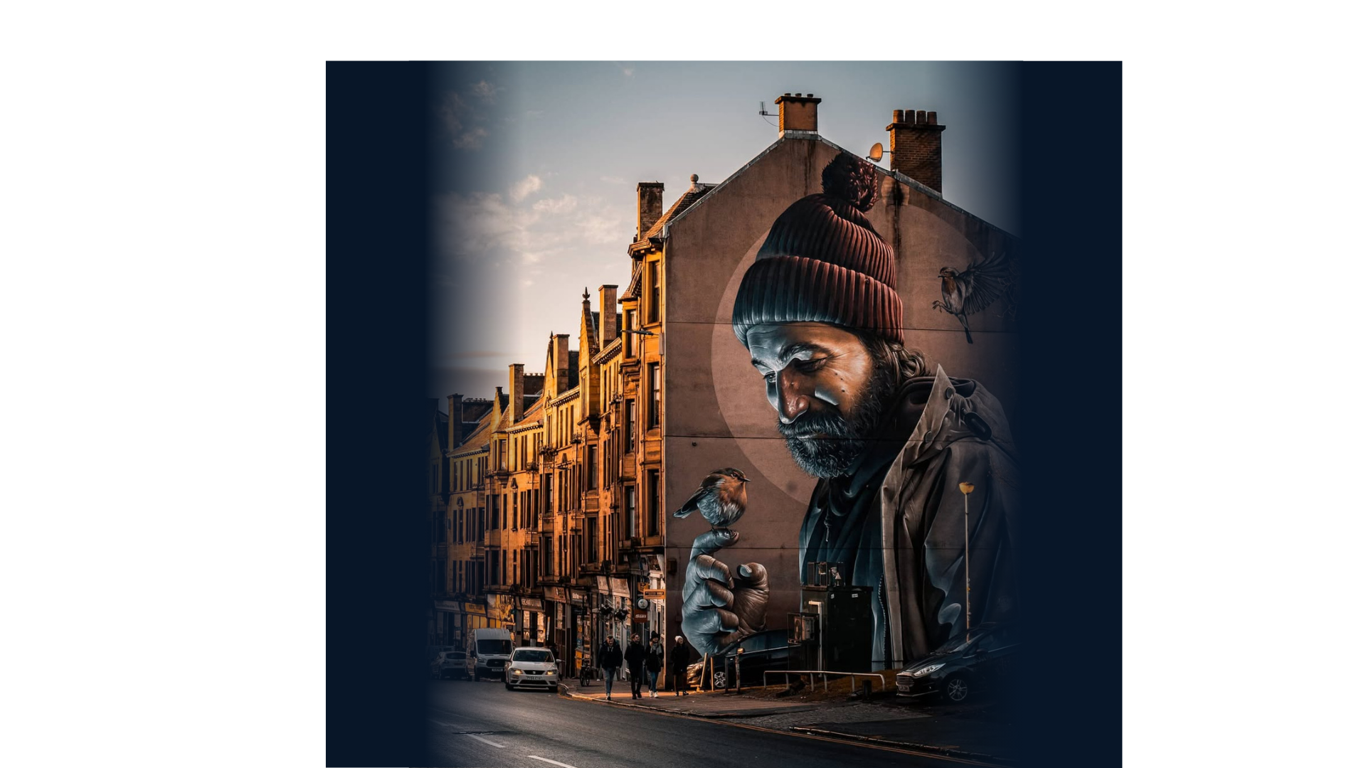 Glasgow street mural of a man holding a robin
